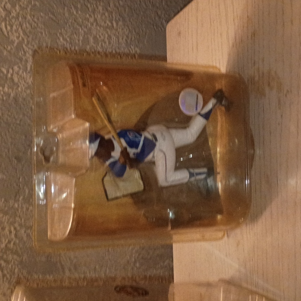 Baseball Player Action Figure in Blue and White Uniform